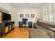 Comfortable office space with natural light, a functional desk setup, and cozy seating area at 177 Ridgeland Ave, Decatur, GA 30030