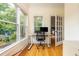 Office space featuring hardwood floors, multiple windows, and glass french doors at 177 Ridgeland Ave, Decatur, GA 30030