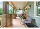 Inviting front porch with seating, offering a relaxing outdoor space with stylish decor at 177 Ridgeland Ave, Decatur, GA 30030