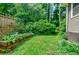 Vegetable garden, fenced yard, and green space add beauty to this outdoor area at 3027 Vista Brook Dr, Decatur, GA 30033