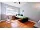 Bright bedroom features hardwood floors, large window, and modern decor at 3027 Vista Brook Dr, Decatur, GA 30033