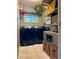 Functional laundry room with modern washer and dryer, shelving, and ample storage space at 3027 Vista Brook Dr, Decatur, GA 30033