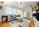 Living room with hardwood floors, comfortable sofa, modern decor, and bright natural lighting at 3027 Vista Brook Dr, Decatur, GA 30033