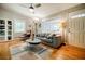 Bright living room with hardwood floors, a comfortable sofa, and modern decor at 3027 Vista Brook Dr, Decatur, GA 30033