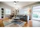 Bright living room with hardwood floors, a comfortable sofa, and modern decor at 3027 Vista Brook Dr, Decatur, GA 30033
