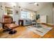 Living room featuring hardwood floors, a comfortable sofa, chair and modern decor at 3027 Vista Brook Dr, Decatur, GA 30033