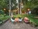 Relaxing patio with string lights, table, and chairs offers a beautiful outdoor entertaining space at 3027 Vista Brook Dr, Decatur, GA 30033
