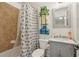 A fully renovated bathroom including a shower with tile surround and new fixtures at 3099 Hidden Falls Dr, Buford, GA 30519
