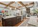Gourmet kitchen with stainless steel appliances, granite counters, and custom cabinets at 3099 Hidden Falls Dr, Buford, GA 30519