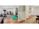 Spacious recreation room features a putting green and an assortment of exercise equipment at 3099 Hidden Falls Dr, Buford, GA 30519
