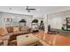 Spacious recreation room features a home gym with workout equipment and a comfortable seating area at 3099 Hidden Falls Dr, Buford, GA 30519