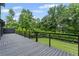 Spacious back deck overlooks a lush backyard, creating a private outdoor retreat at 5254 Greenpoint Drive, Stone Mountain, GA 30088