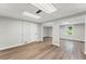 Finished basement with wood-look flooring, neutral paint, and recessed lighting offers flexible living space at 5254 Greenpoint Drive, Stone Mountain, GA 30088