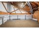 Upstairs bonus room with vaulted ceilings and exposed brick detail at 5254 Greenpoint Drive, Stone Mountain, GA 30088