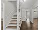 Bright foyer featuring staircase and hardwood floors at 5254 Greenpoint Drive, Stone Mountain, GA 30088