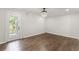 Bright living room with hardwood floors and a door to the outdoor space at 5254 Greenpoint Drive, Stone Mountain, GA 30088