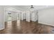 Open-concept living room with hardwood floors and ample natural light at 5254 Greenpoint Drive, Stone Mountain, GA 30088