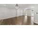 Spacious living room featuring hardwood floors and neutral paint at 5254 Greenpoint Drive, Stone Mountain, GA 30088