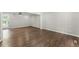 Spacious living room featuring hardwood floors and neutral paint at 5254 Greenpoint Drive, Stone Mountain, GA 30088