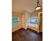 Bathroom features a soaking tub, glass shower, and window with natural light at 5688 Baffin Rd, Atlanta, GA 30349