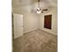 Bedroom with carpet and ceiling fan at 5688 Baffin Rd, Atlanta, GA 30349