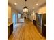 Modern kitchen features stainless steel appliances, granite countertops, and hardwood floors at 5688 Baffin Rd, Atlanta, GA 30349