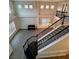 Bright and airy living room, hardwood floors, and ample natural light from upper windows at 5688 Baffin Rd, Atlanta, GA 30349