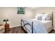 Cozy bedroom with hardwood floors, soft lighting, and charming decorative accents at 1320 Northcliff Trce, Roswell, GA 30076