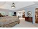 Expansive Primary bedroom featuring tray ceilings and an attached living area at 1320 Northcliff Trce, Roswell, GA 30076