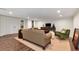 Inviting living room with hardwood floors, comfortable seating, and a neutral color palette at 1320 Northcliff Trce, Roswell, GA 30076