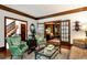 Comfortable living room featuring hardwood floors, a glass coffee table and traditional furnishings at 1320 Northcliff Trce, Roswell, GA 30076