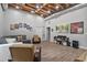 Finished basement with high ceilings, tile floors, and a comfortable seating area, perfect for entertaining at 1775 Porterton Way, Cumming, GA 30041