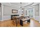 Formal dining room with hardwood floors and bright bay windows at 1775 Porterton Way, Cumming, GA 30041