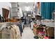 Spacious walk-in closet with shelves and clothing racks at 1775 Porterton Way, Cumming, GA 30041