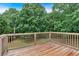 This wooden deck overlooks the backyard at 33 Moriah Ne Way, Rydal, GA 30171