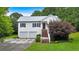 Attractive two-story house with white siding, black shutters, and well-maintained lawn at 33 Moriah Ne Way, Rydal, GA 30171