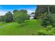 Scenic view of a well-kept front yard with a home and mature trees at 33 Moriah Ne Way, Rydal, GA 30171