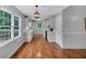 Bright kitchen with white cabinetry, natural light, and hardwood floors at 33 Moriah Ne Way, Rydal, GA 30171