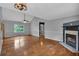 Spacious living area with hardwood floors, vaulted ceilings and a charming fireplace at 33 Moriah Ne Way, Rydal, GA 30171