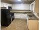 Kitchen featuring sleek, granite countertops and white cabinets at 5000 Saxony Ct, Stone Mountain, GA 30083