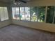Sunroom with plenty of windows to let in natural light at 5000 Saxony Ct, Stone Mountain, GA 30083