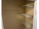 Spacious walk-in closet equipped with multiple wire shelves for ample storage and organization at 5000 Saxony Ct, Stone Mountain, GA 30083