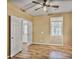 Bright bedroom with vaulted ceiling, ceiling fan, and light hardwood floors offers a modern and comfortable living space at 747 Gardenside Se Cir, Marietta, GA 30067