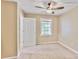 Neutral bedroom with carpet, ceiling fan, and window offers a cozy and inviting space at 747 Gardenside Se Cir, Marietta, GA 30067