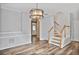 Charming dining area featuring a modern chandelier and easy access to the staircase at 747 Gardenside Se Cir, Marietta, GA 30067