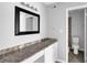 Bathroom featuring a decorative countertop and undermount sink at 2972 Parc Lorraine, Lithonia, GA 30038