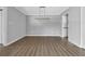 Dining room with a modern chandelier and views to the kitchen in this open floor plan at 2972 Parc Lorraine, Lithonia, GA 30038