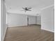 Light and bright living area with modern lighting and view to adjacent dining and fireplace at 2972 Parc Lorraine, Lithonia, GA 30038