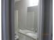 Bathroom featuring modern vanity, sink, fixtures, and a shower-tub combo at 2975 Wintercrest Trce, Dunwoody, GA 30360