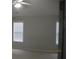 Cozy bedroom with neutral carpet, ceiling fan, and two bright windows at 2975 Wintercrest Trce, Dunwoody, GA 30360